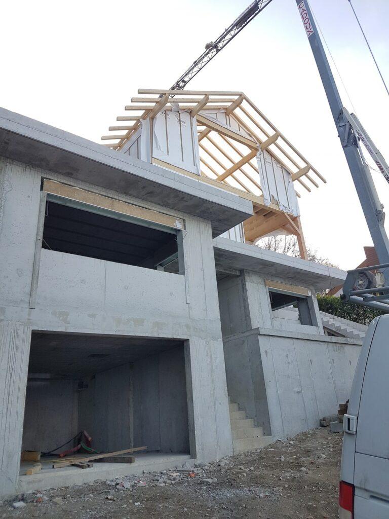 Construction d'une surélévation d'une maison en bois